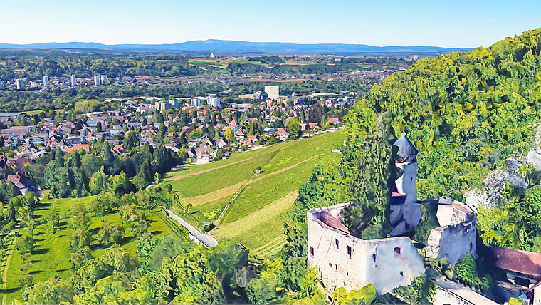 Unscheinbar im Hintergrund: Eine Visualisierung zeigt, wie das weisse Hochhaus, vom Schloss Birseck aus gesehen, wirken würde.  Visualisierung: ZVG